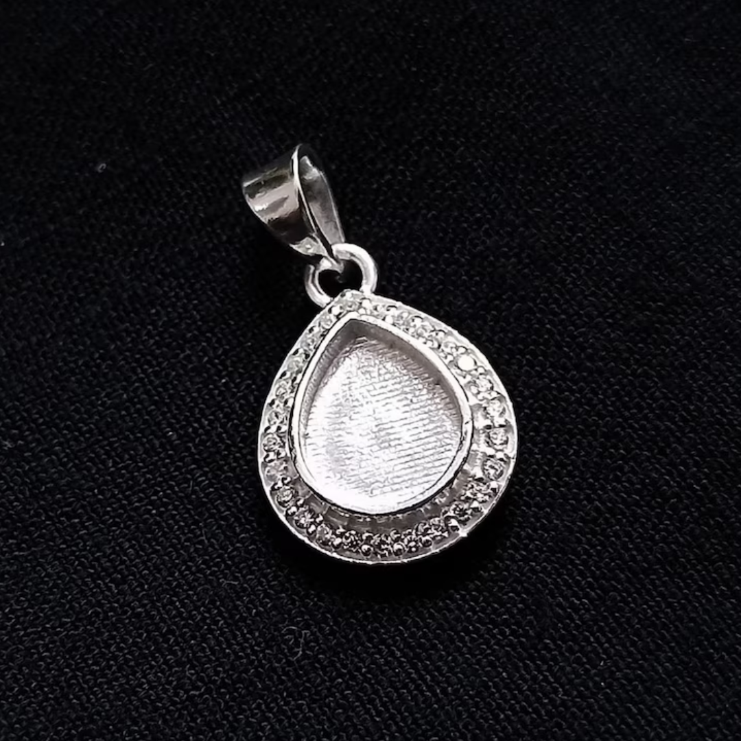 Henrietta - Pear Shape with Zircon