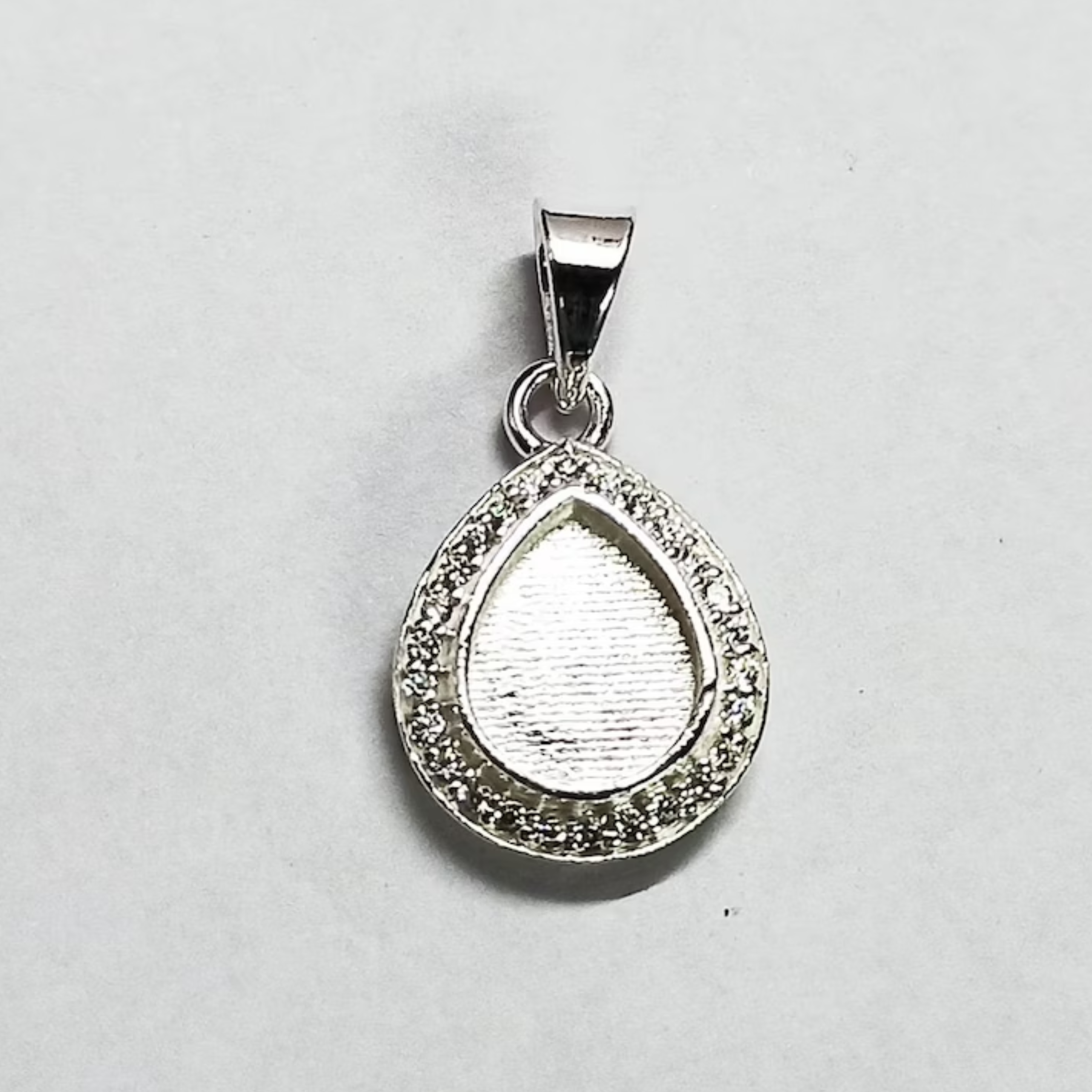 Henrietta - Pear Shape with Zircon